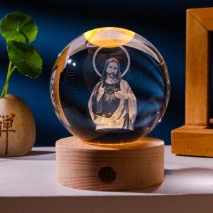 Luminous crystal ball with carved Jesus solid wood base for home decoration